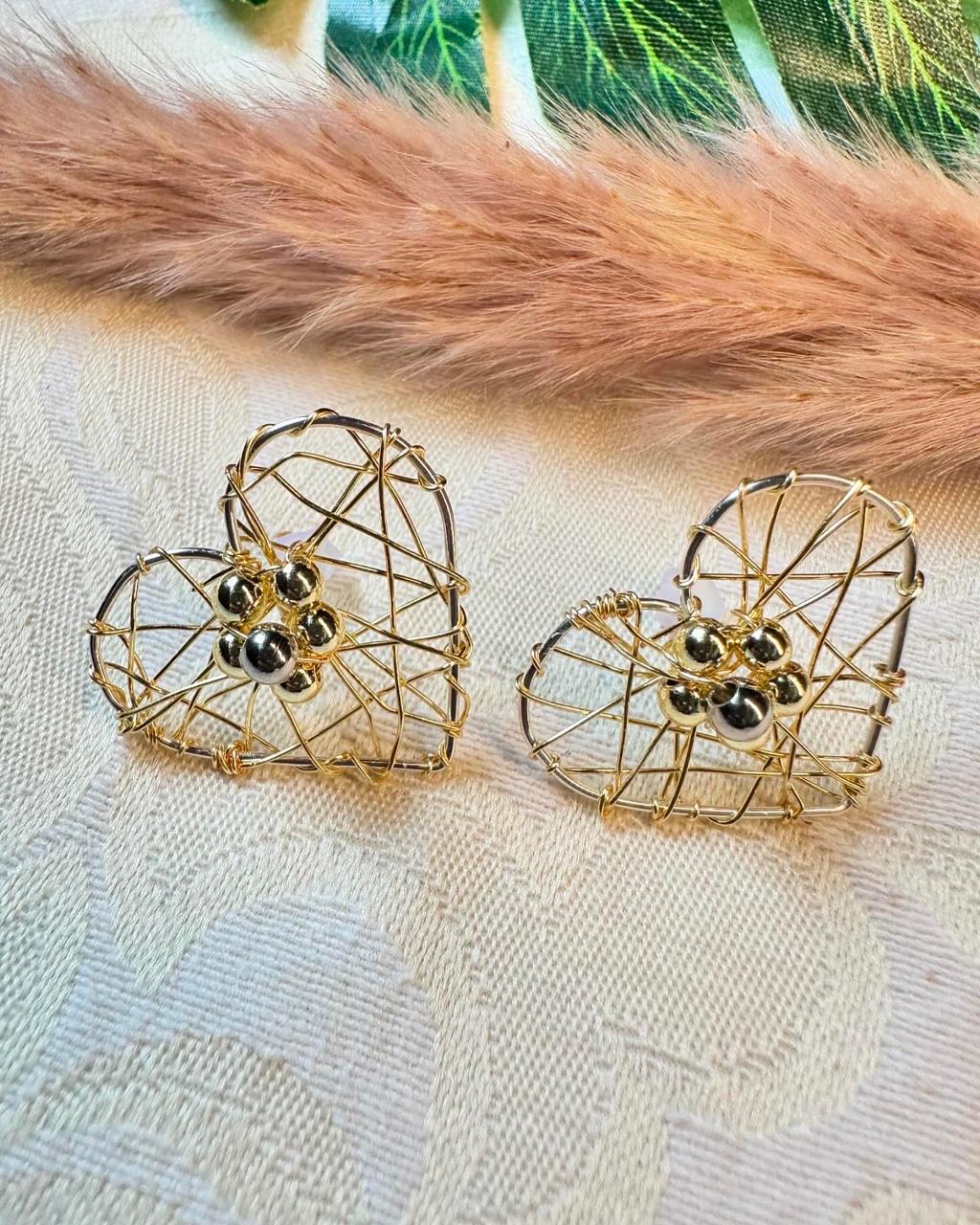 Aretes de Corazon con flor de Acero